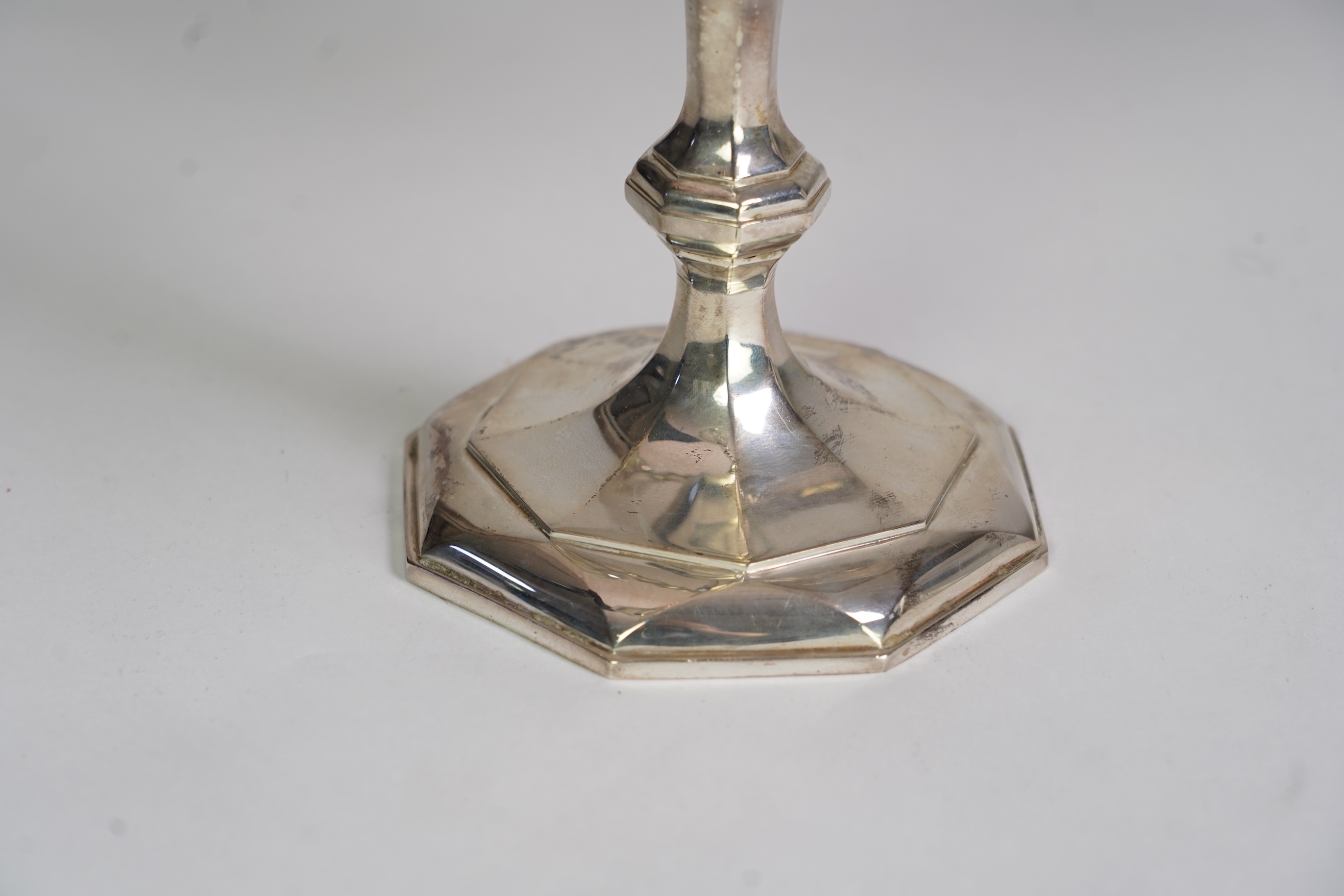 An Elizabeth II silver four branch, four light candelabrum by William Comyns & Sons Ltd